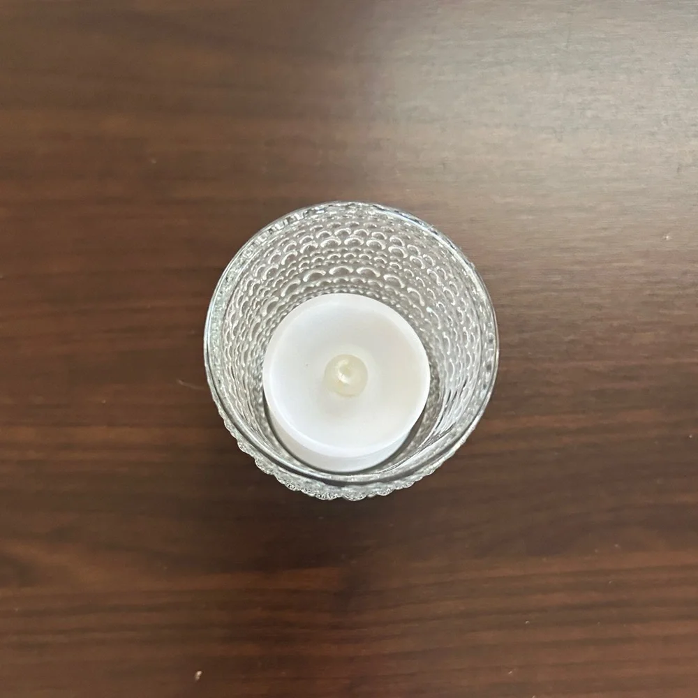 Set of 18 glass votive candle holders with tea lights